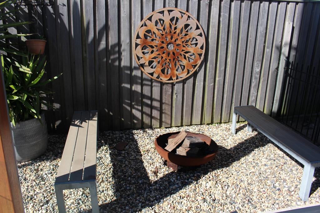 Outdoor fire pit at Waterside Escape