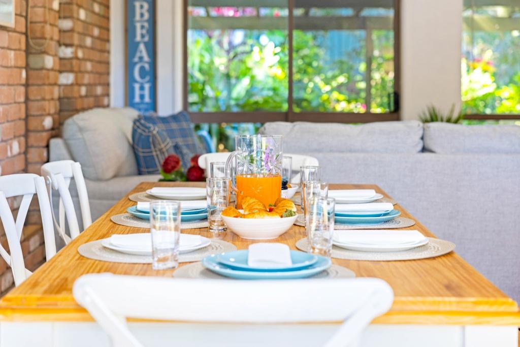 Beachside holiday rental in Port Macquarie with swimming pool, modern amenities, and spacious outdoor entertaining area. Short drive to Flynns Beach. Perfect coastal getaway for families and couples.