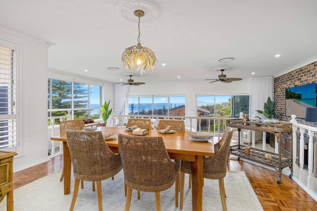 Dining room in open plan living area. Table and chairs with water views of Lighthouse Beach. Beached at Lighthouse Port Macquarie